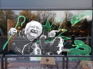 New St. Patrick’s Day mural shows President Higgins and his dogs chase out the snakes