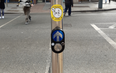 These contactless pedestrian buttons are being rolled out around the city