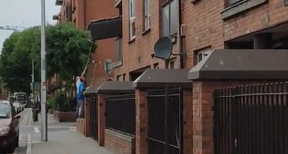 WATCH: Just another normal day in Dublin as a couch is manoeuvred off a balcony using brooms