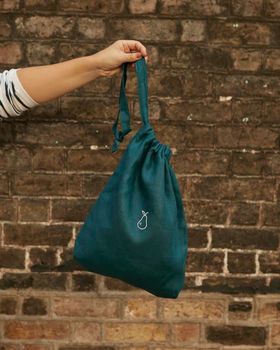 Bag pepper pot held brick wall