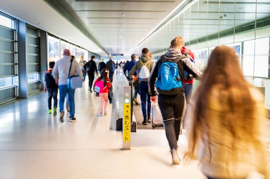 groups of people travelling through Dublin Airport