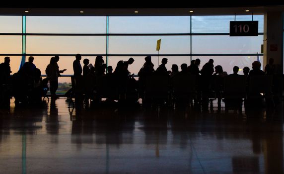 people queueing by a window at Dublin Airport