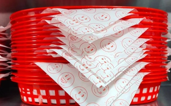 red food baskets and wax paper in a food truck