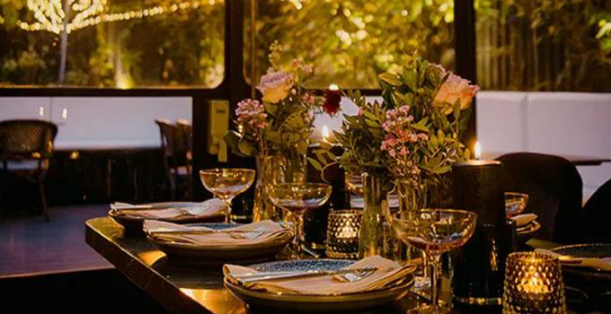 table setting with flowers and candles at Lenehans Rathmines