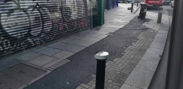 tar blob on a pavement in Dublin