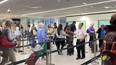 ‘Relentlessly peppy’ airport worker goes viral for keeping security queue entertained